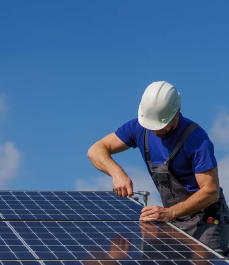 man-worker-installing-solar-photovoltaic-panels-on-2022-11-12-14-54-17-utc-1.jpg